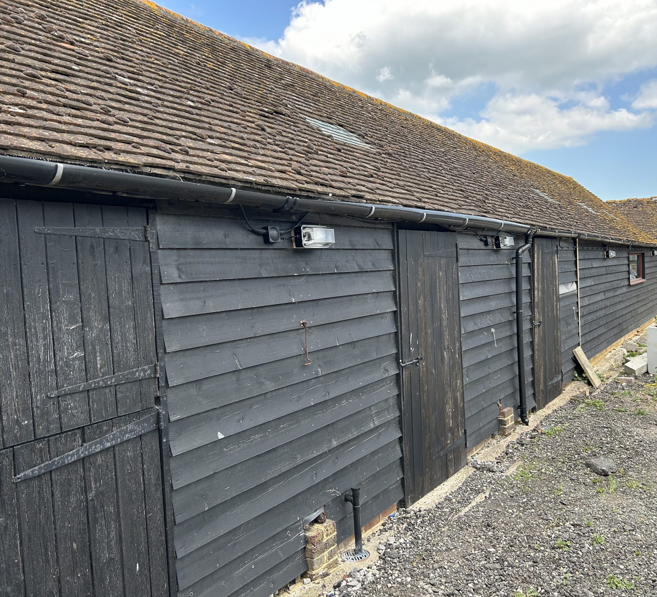 Exterior of a barn or garage with interior renovations completed.