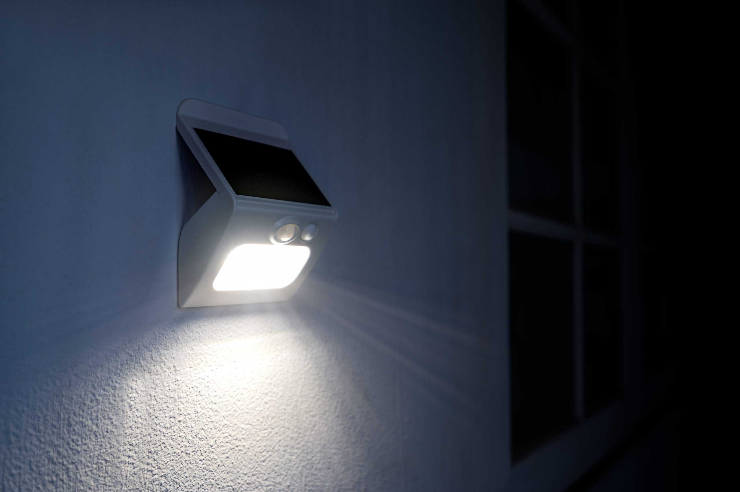 Small solar powered led light with motion sensor.