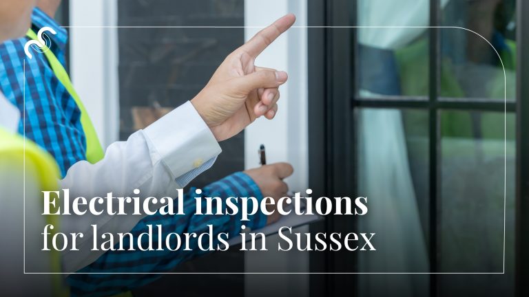 Two electricians inspecting a house for an EICR (Electrical Installation Condition Report)