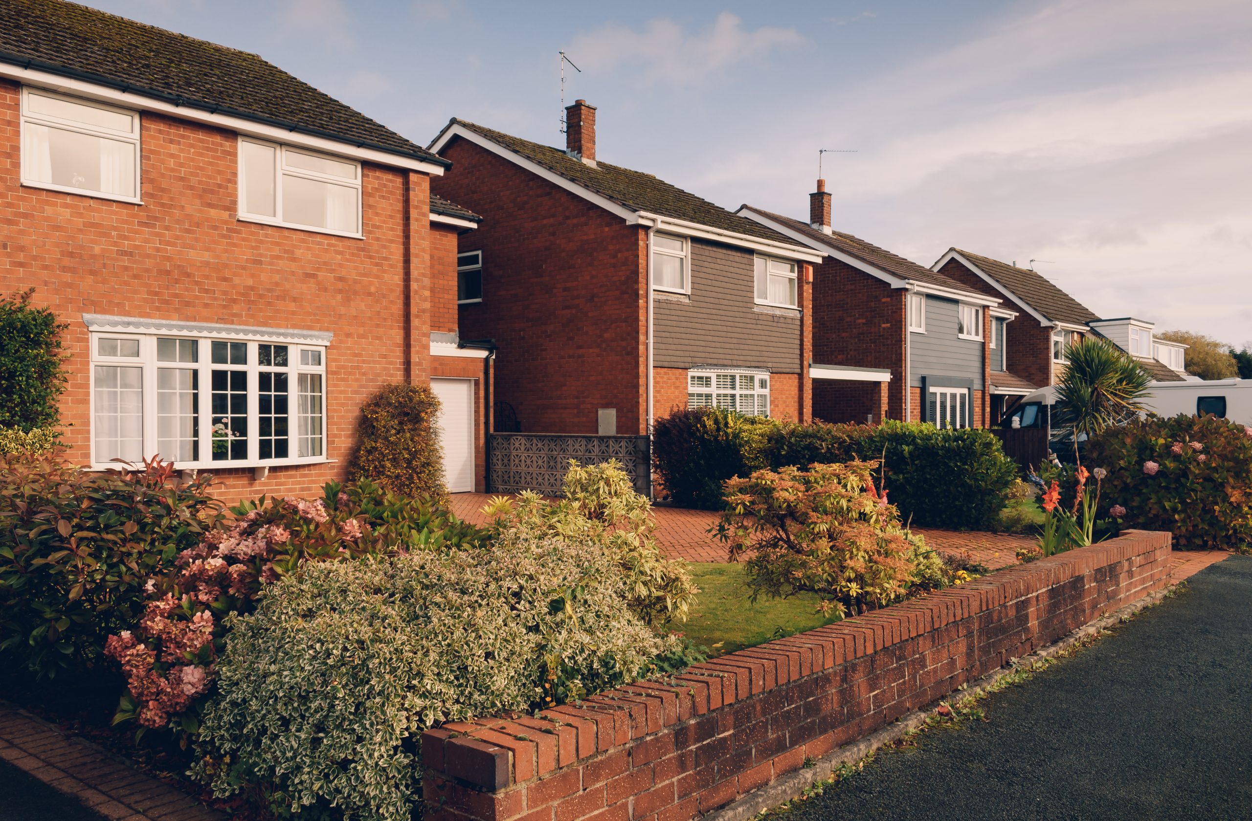 English houses in the suburbs. English lifestyle. Houses in a village.