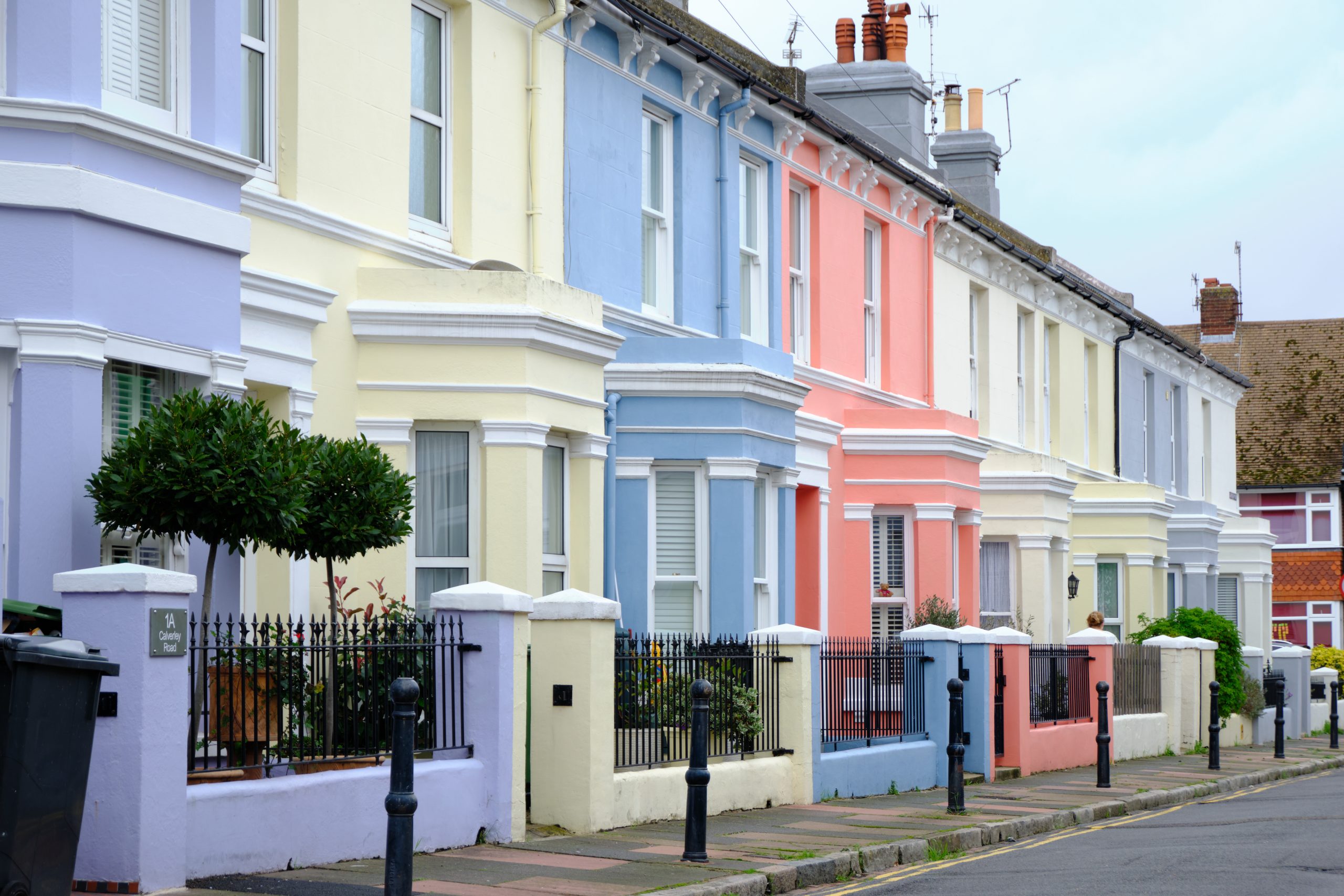 English street with colourful vintage terraced houses.