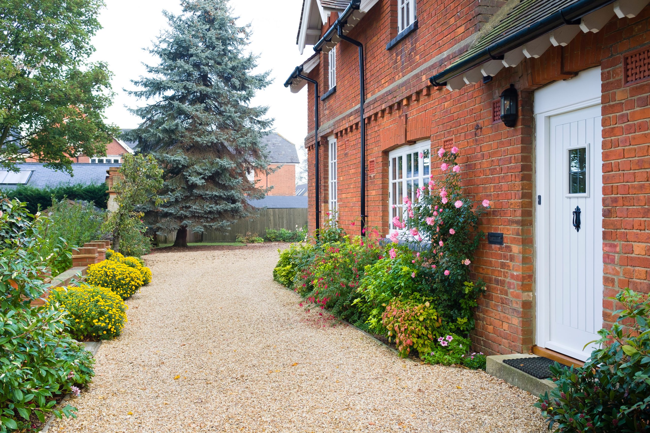 English country house, garden and driveway