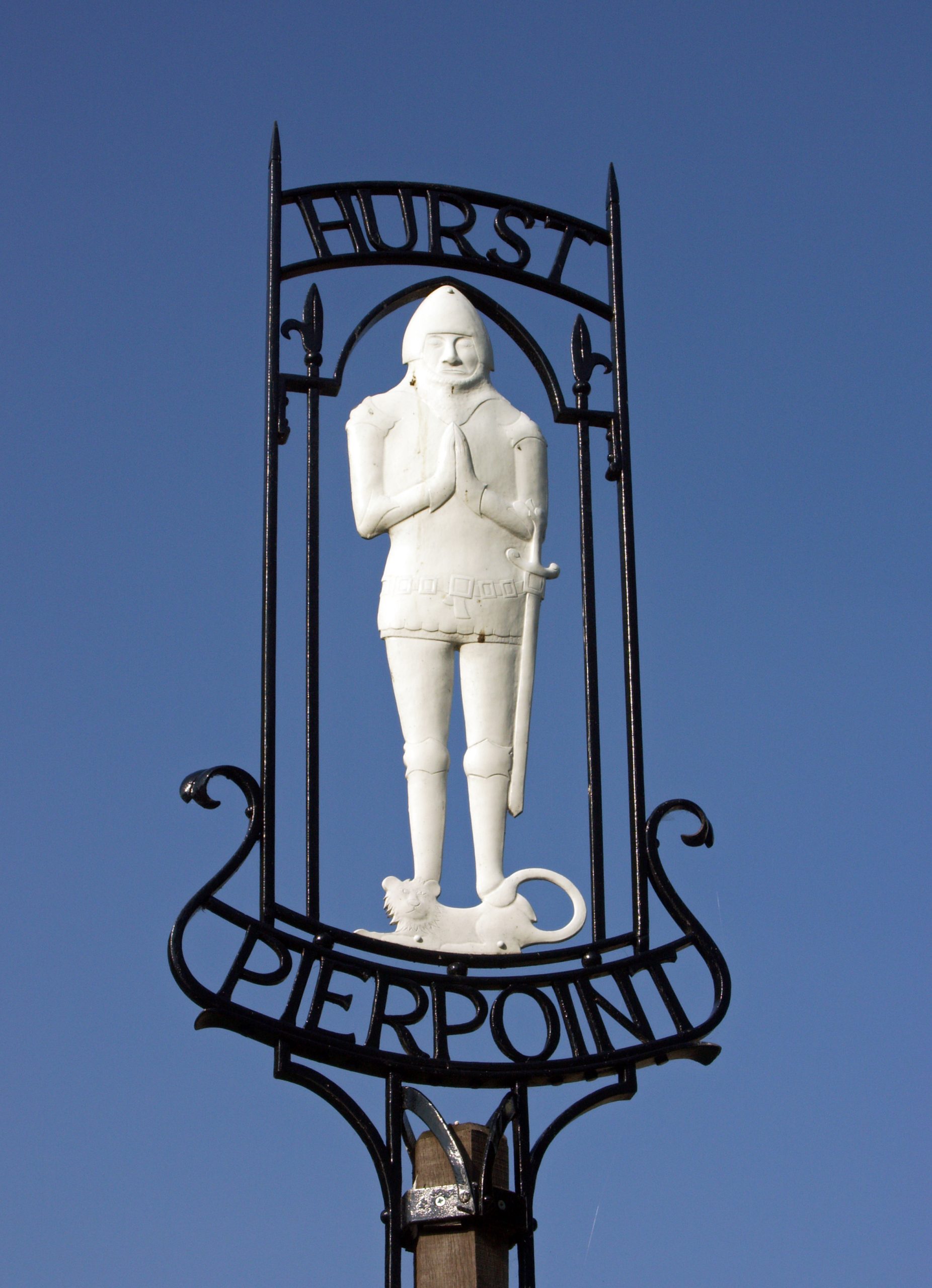 Village Sign showing a Historical Medieval Knight, Hurstpierpoint, West Sussex, England, UK