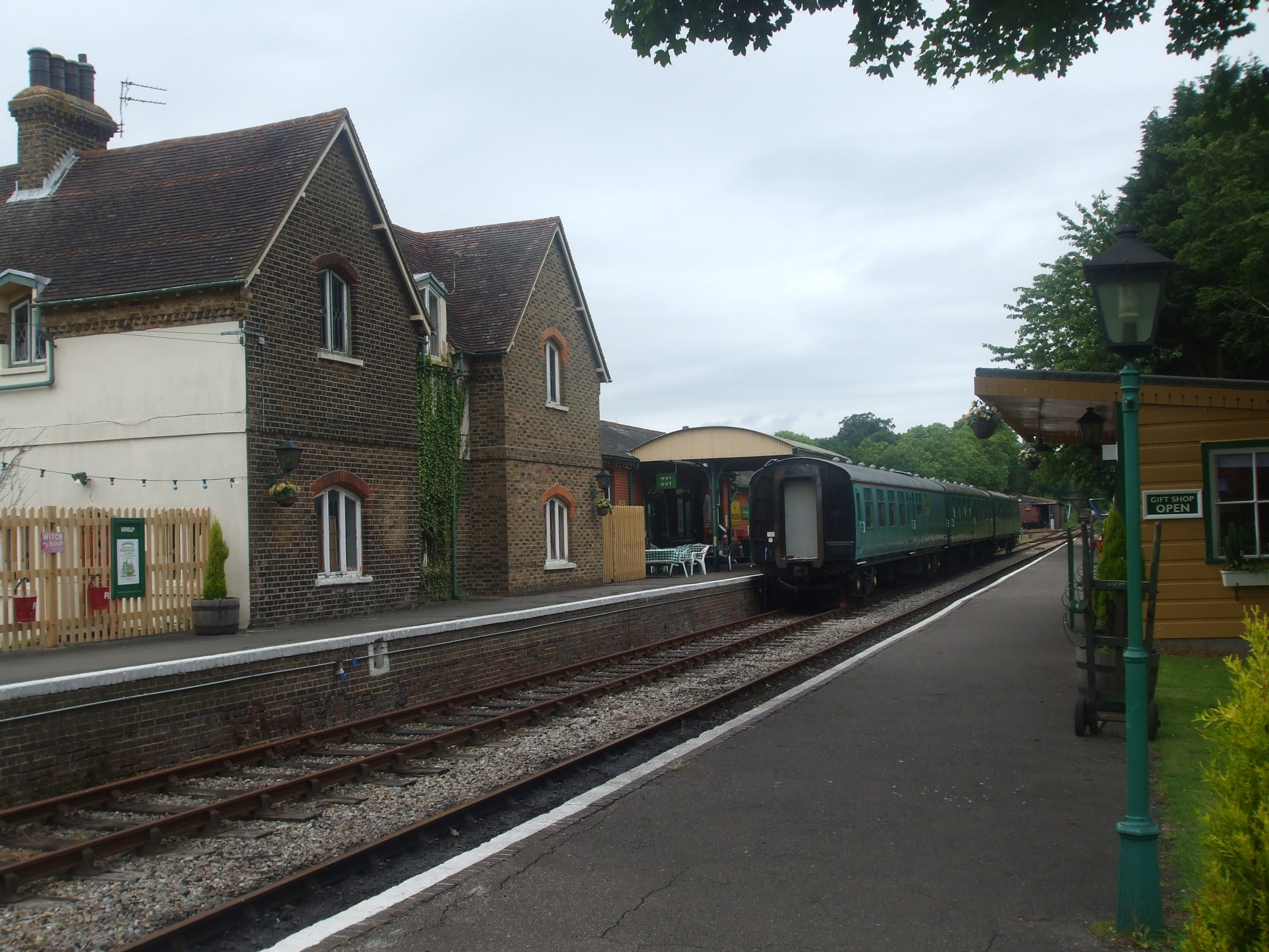 Isfield Station, with train departing